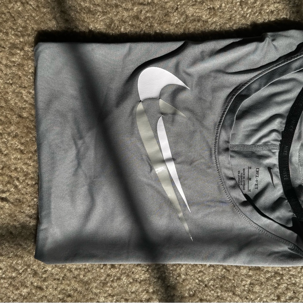Nike Silver and Gray T-Shirt with Swoosh
